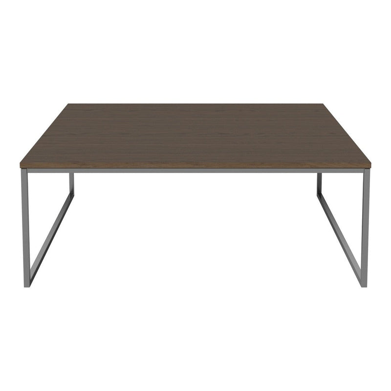Rectangular coffee table with a dark brown wood surface and sleek silver metal legs. Simple, modern design.
