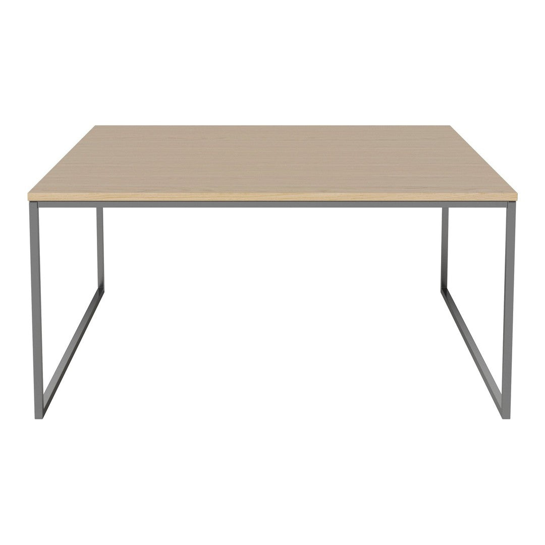 Light wood tabletop with a smooth finish and minimalist gray metal legs, perfect for modern decor.