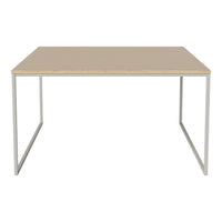 Neutral beige tabletop with natural wood grain and sleek silver metal legs for a modern, minimalistic look.