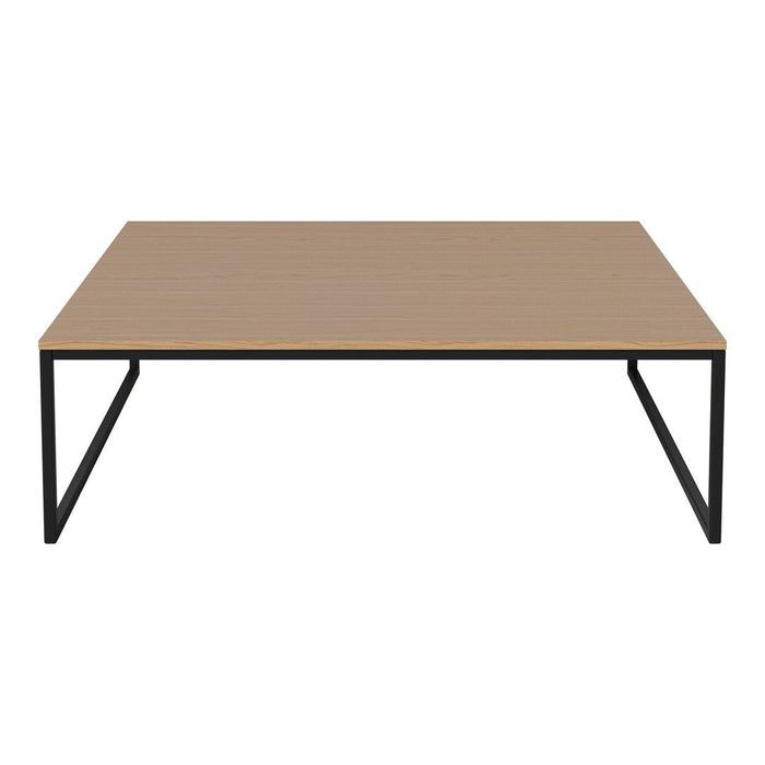 Square wooden coffee table with a light brown top and sleek black metal legs, featuring a minimalist design.