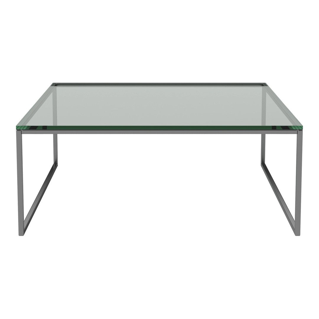 Clear glass coffee table with sleek silver metal legs, featuring a minimalist design and modern aesthetic.