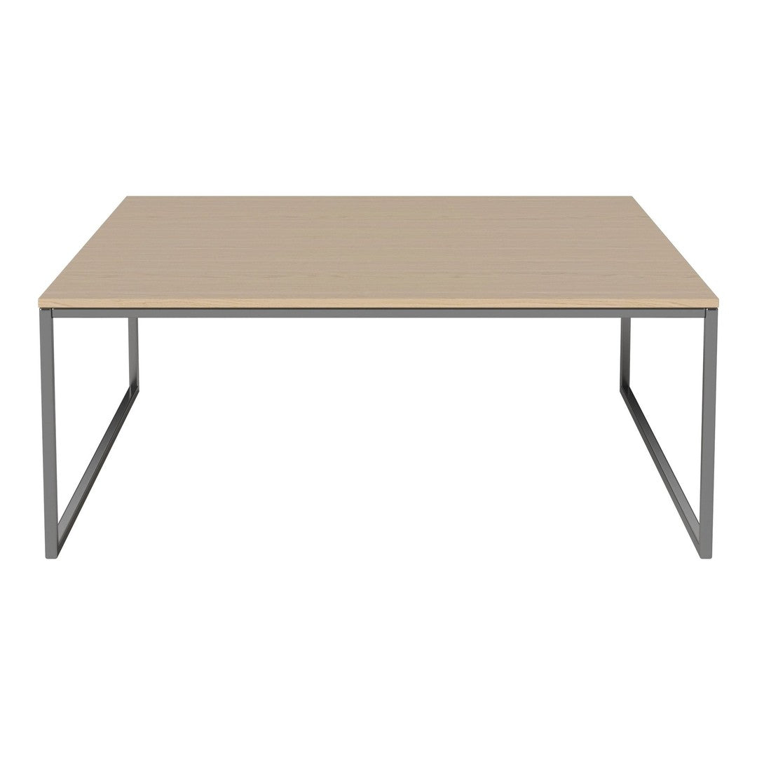 Light beige tabletop with a sleek, minimalistic design and silver metallic legs. Modern, versatile style for any space.