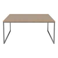 Light brown tabletop with a smooth finish, complemented by a sleek, minimalist metal frame in silver.
