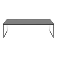 Minimalist rectangular coffee table with a sleek grey glass top and black metal frame. Perfect for modern interiors.
