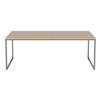 Simple beige tabletop with a smooth finish, paired with sleek silver metal legs for a modern, minimalist look.