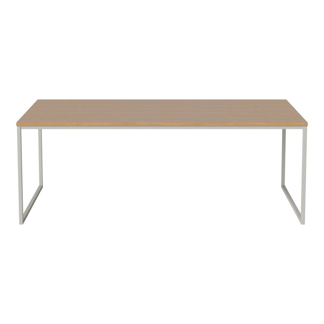 Light wood tabletop with a smooth finish and sleek silver metal legs, offering a modern and minimalist design.