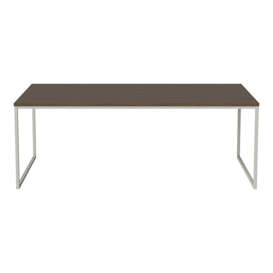 Brown tabletop with a smooth finish, paired with sleek silver legs in a minimalist design. Perfect for modern decor.