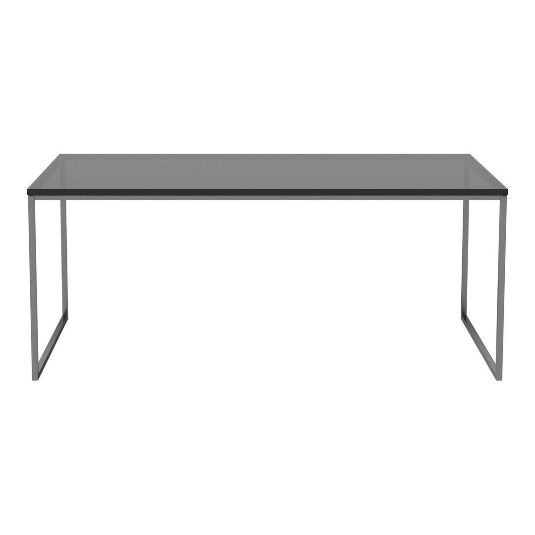 Modern gray glass table with a sleek silver frame, featuring a minimalist design. Perfect for contemporary spaces.