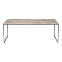 Modern gray stone tabletop with a sleek metal frame, showcasing a minimalist design and neutral tones.