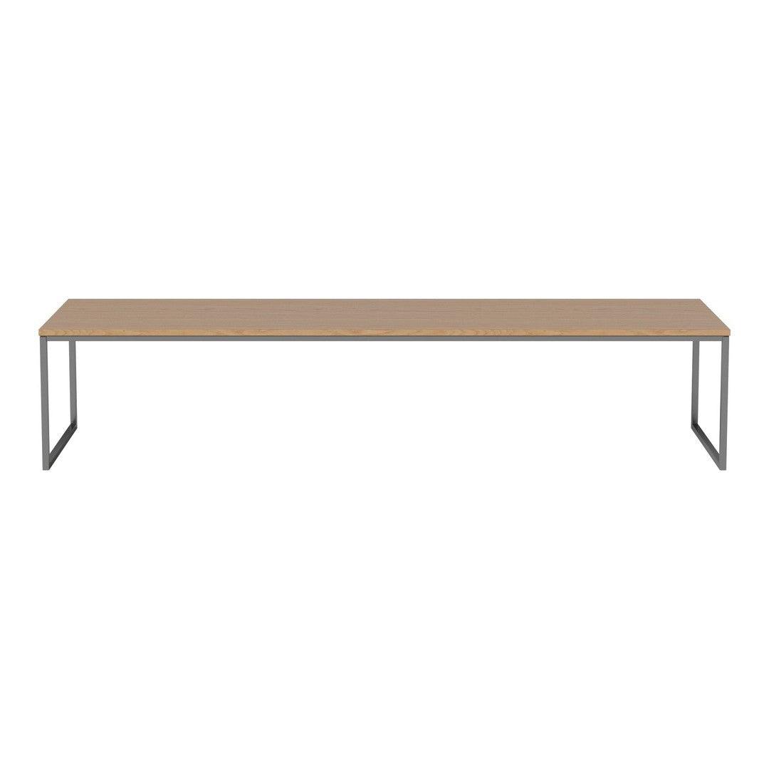 Long rectangular table with a light wood finish and sleek metallic gray legs, offering a modern minimalist design.