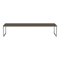 Long brown tabletop with a smooth finish and sleek silver metal legs. Modern, minimalist design for versatile use.