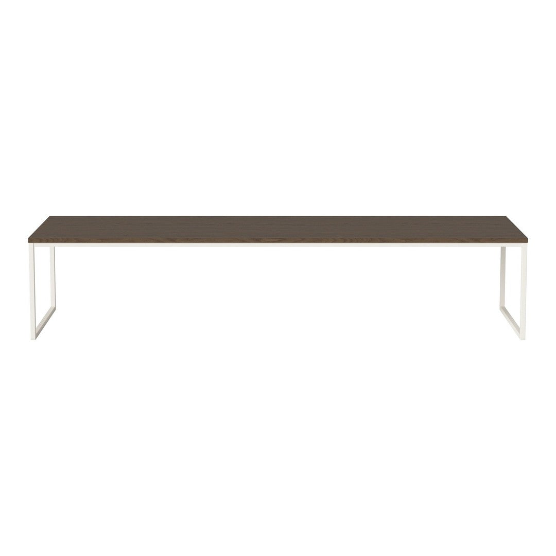Long rectangular table with a dark wood finish and sleek white metal legs, perfect for modern decor.