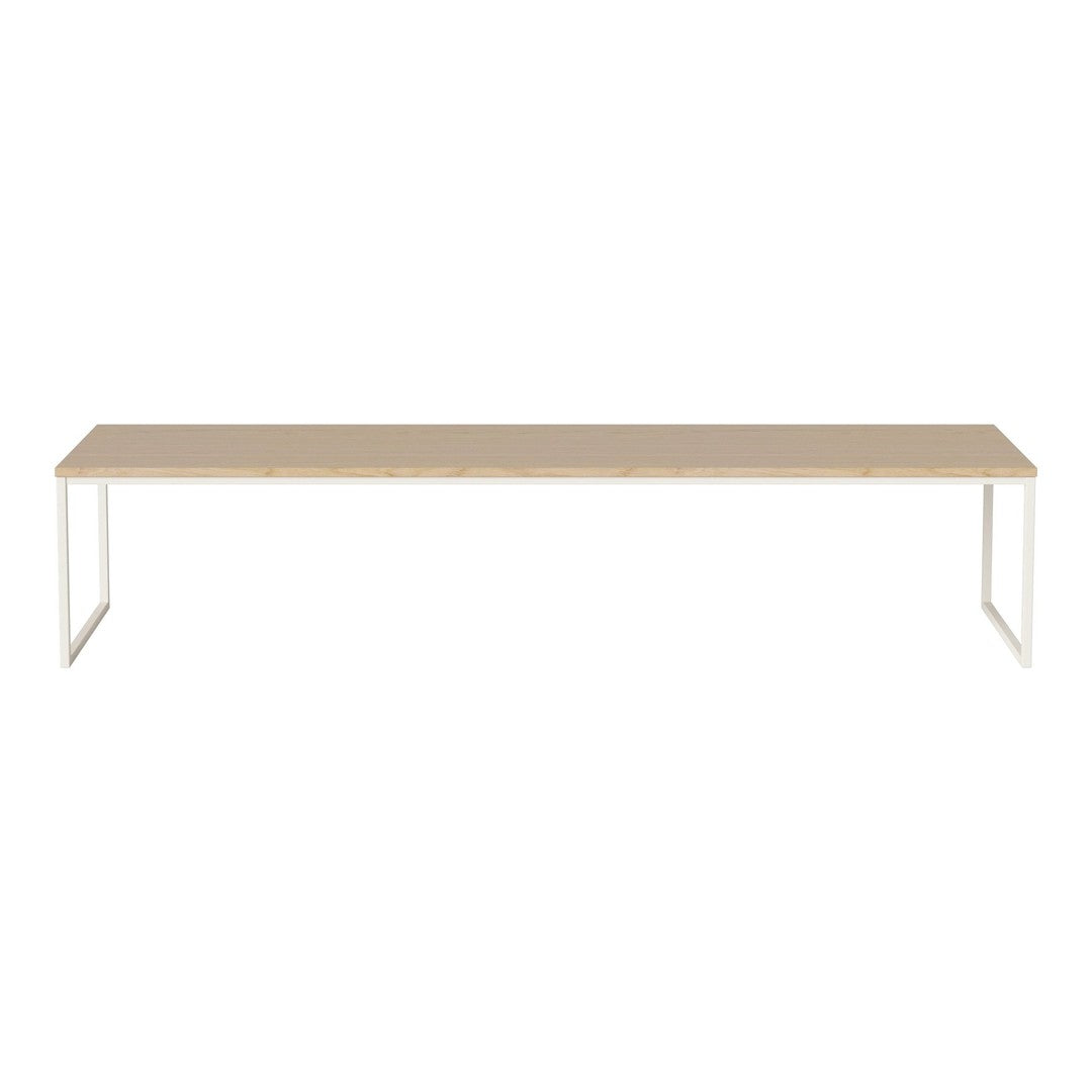Beige rectangular tabletop with a smooth finish, supported by sleek white metal legs. Minimalist and modern design.