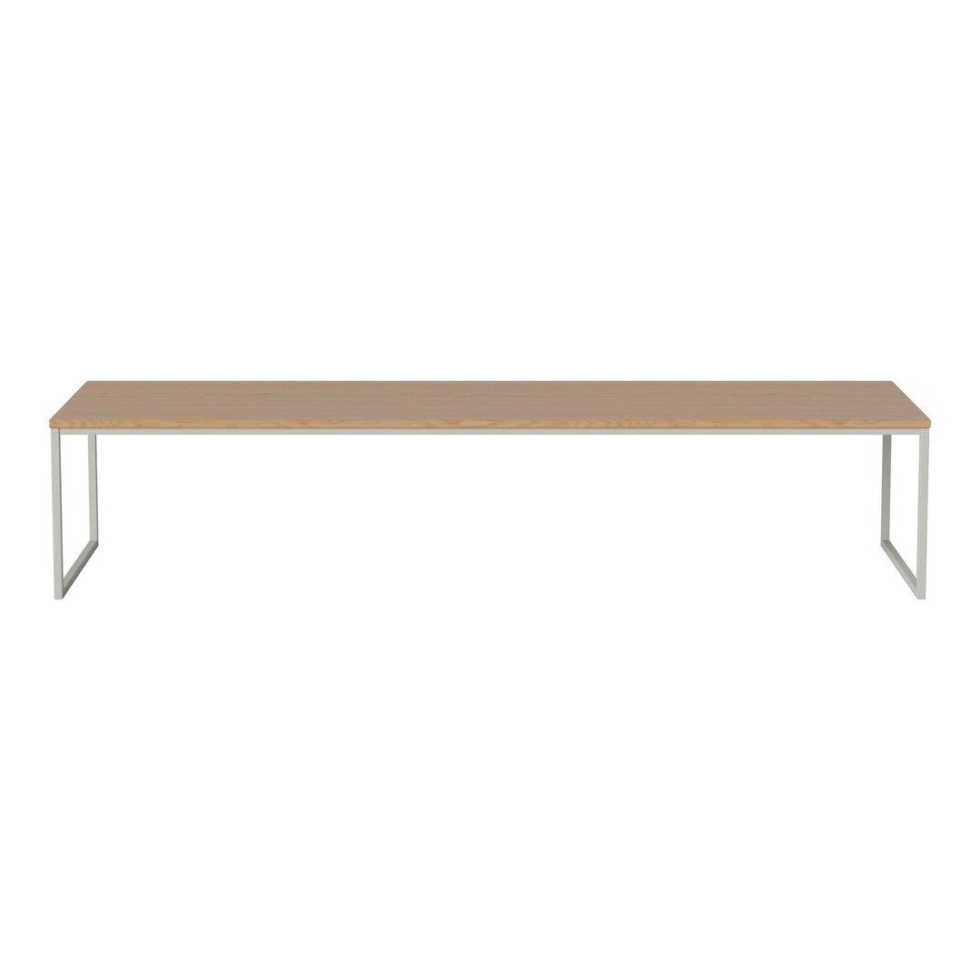 Stylish rectangular table with a light wood finish and sleek metal legs in a minimalist design. Perfect for modern spaces.