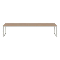 Stylish rectangular table with a light wood finish and sleek metal legs in a minimalist design. Perfect for modern spaces.