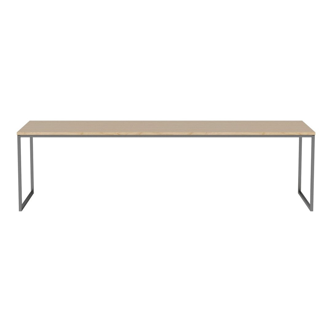 Light wood tabletop with a smooth finish, supported by sleek black metal legs, creating a modern minimalist design.