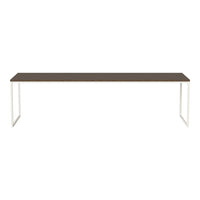 Long rectangular table featuring a dark wood top and sleek white metal legs, minimalist design with no patterns.