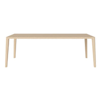 Light wood dining table with simple design, featuring smooth, natural grain and subtle beige tones. Ideal for modern decor.