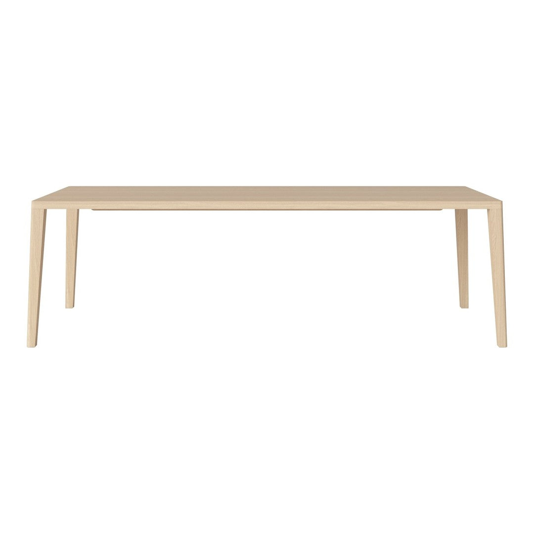 Light beige rectangular table with smooth, minimalistic design and clean lines, perfect for modern interiors.