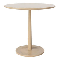 Minimalist round table in natural wood finish, featuring a smooth surface and sleek, simple design.