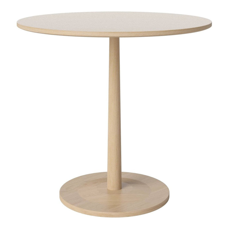 Minimalist round table in natural wood finish, featuring a smooth surface and sleek, simple design.