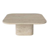 Beige square coffee table with smooth, matte finish and rounded edges; minimalist design complements modern decor.