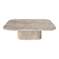Light beige marble coffee table with a smooth, polished surface and rounded edges, featuring subtle veining patterns.