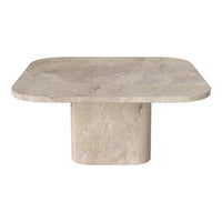Square marble table with a smooth, light beige surface and subtle, natural veining patterns. Perfect for modern decor.