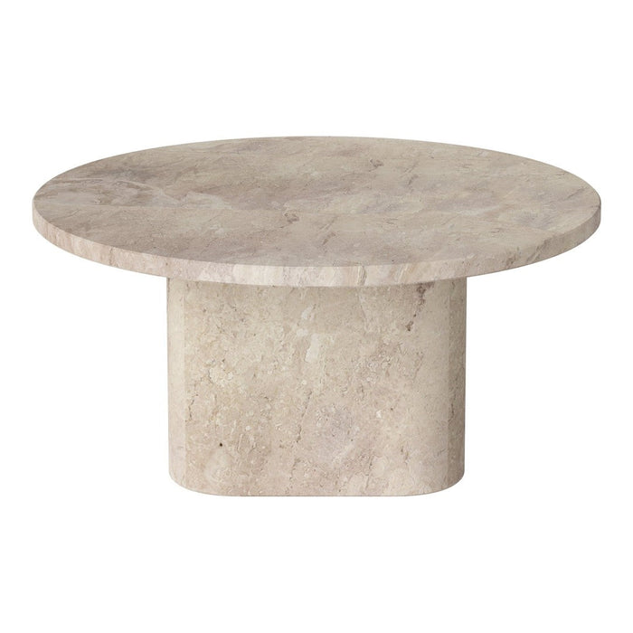Round beige travertine table with a smooth, matte finish and subtle natural patterns. Ideal for modern decor.