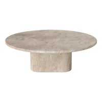 Round beige marble coffee table with smooth, subtle patterns and a sturdy cylindrical base.