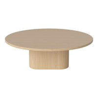 Light wooden round coffee table with a smooth finish and minimalist design. Perfect for modern living spaces.