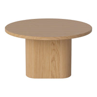 Round wooden coffee table in light oak finish with a smooth, minimalist design and solid cylindrical base.