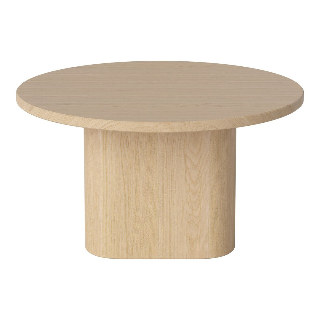 Light wood round coffee table with a smooth surface and a minimalist cylindrical base. Modern and neutral design.