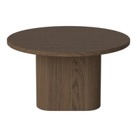 Round brown coffee table with a smooth wood grain finish and a minimalist design. Perfect for modern decor.