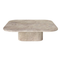 Rectangular stone coffee table in soft beige tones with subtle texture and elegant, smooth rounded edges.