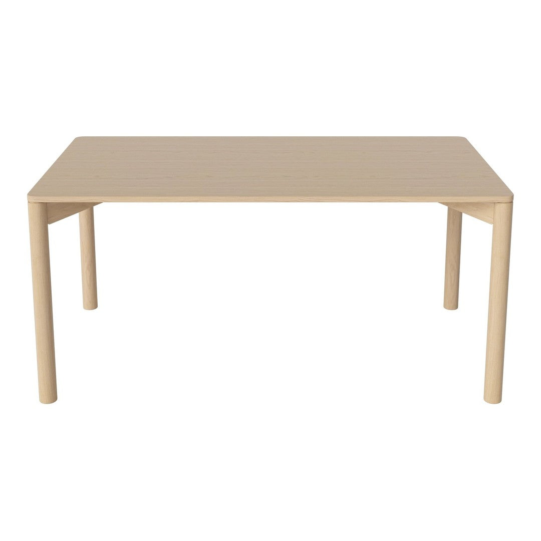 Beige rectangular table with a smooth surface and simple, minimalist design. Versatile for any decor style.