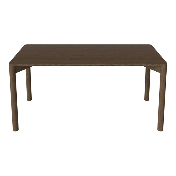 Brown rectangular dining table with a smooth, solid surface and simple, modern design. Ideal for contemporary spaces.