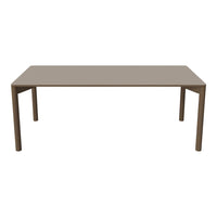 Rectangular table in a soft beige color with a smooth, matte finish and sleek, modern design.