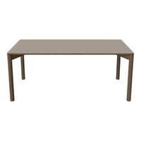 Rectangular dining table in a sleek light brown finish with smooth, matte surface and minimalist design.