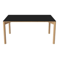 Black table top with natural wood legs, featuring a minimalist design and smooth surface. Perfect for modern decor.