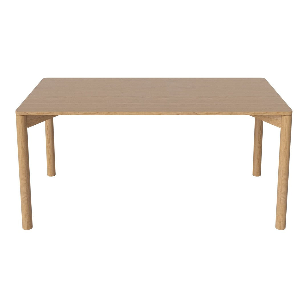 Light oak rectangular dining table, featuring a smooth natural finish with simple, clean lines and no visible patterns.