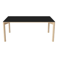 Black tabletop with natural wood legs, showcasing a sleek modern design and minimalist style.
