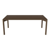 Brown rectangular table with a smooth, solid surface and sleek, modern legs. Ideal for dining or workspace settings.