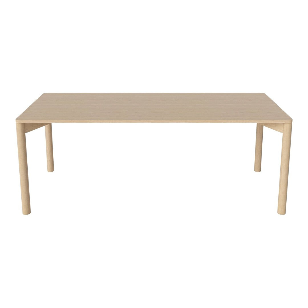 Rectangle dining table in a smooth beige finish, featuring minimalist design with no patterns. Perfect for modern decor.