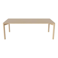 Beige rectangular dining table with a smooth, minimalist design and sleek, straight legs. Perfect for modern interiors.