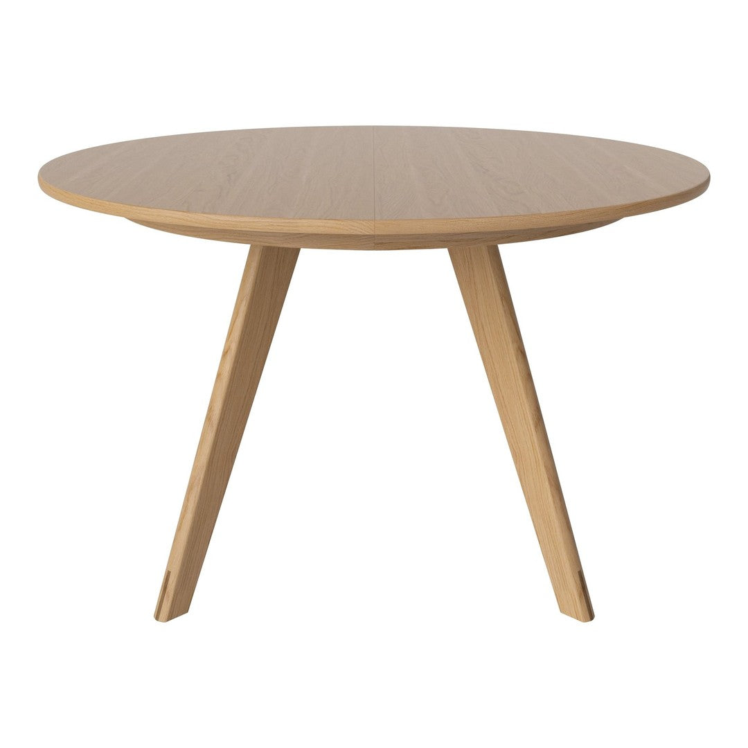 Light wood round table with a smooth finish and tapered legs, showcasing a minimalist design and natural hues.