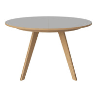 Round gray tabletop with natural wood legs, showcasing a minimalist design suitable for modern decor.