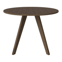 Round wooden table in a rich dark brown finish with minimalist light brown tapered legs. Perfect for modern decor.
