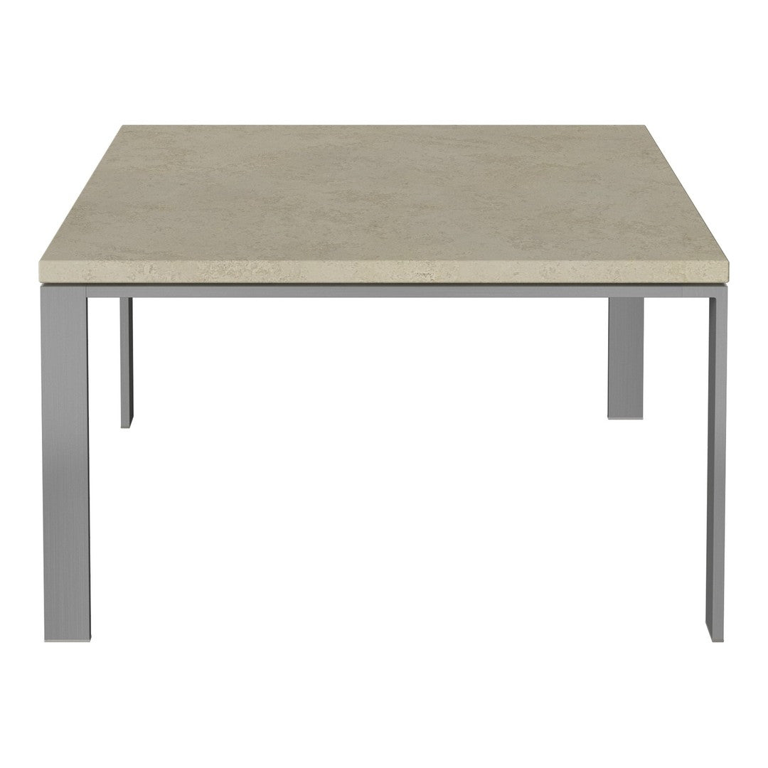 Square table featuring a light beige stone top and sleek silver metal legs. Minimalist design with subtle tones.