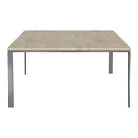 Square table with a light concrete top and sleek silver metal legs, featuring a minimalist design and neutral tones.